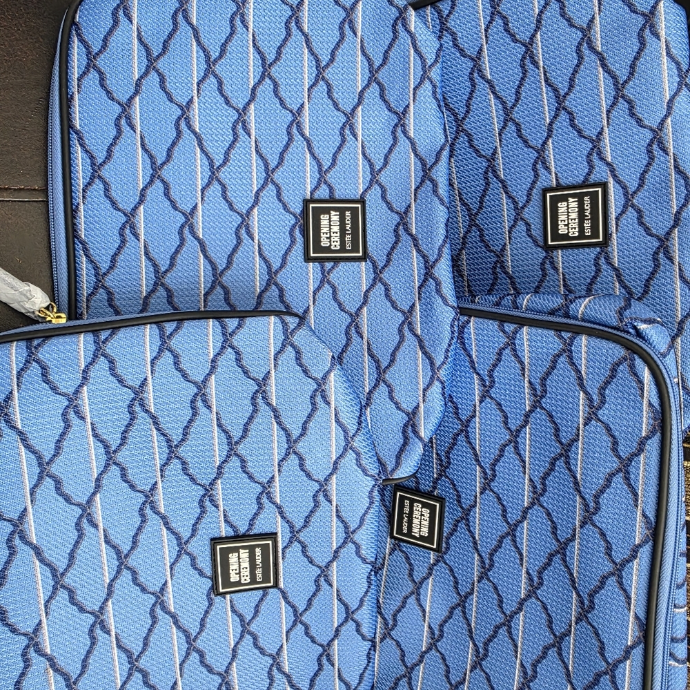 Estee Lauder Blue and Black Patterned Makeup Bag. 4 For $18. All New.